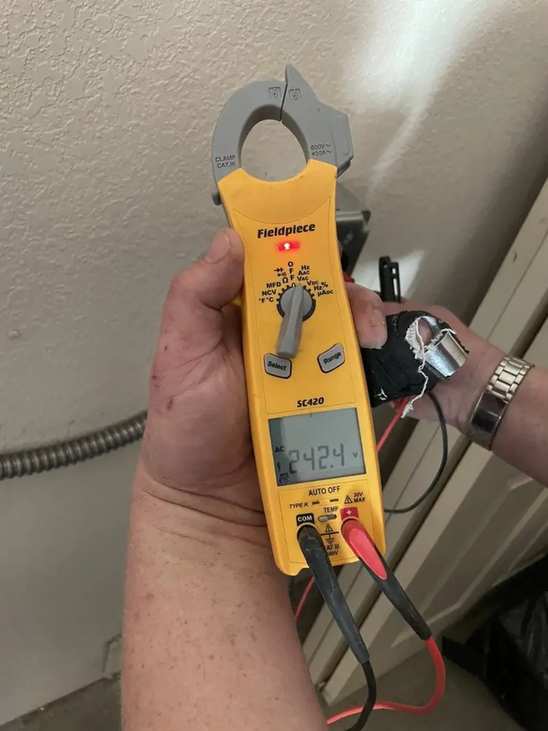 Voltage testing with clamp meter during Whole House Surge Protector in Fort Wright